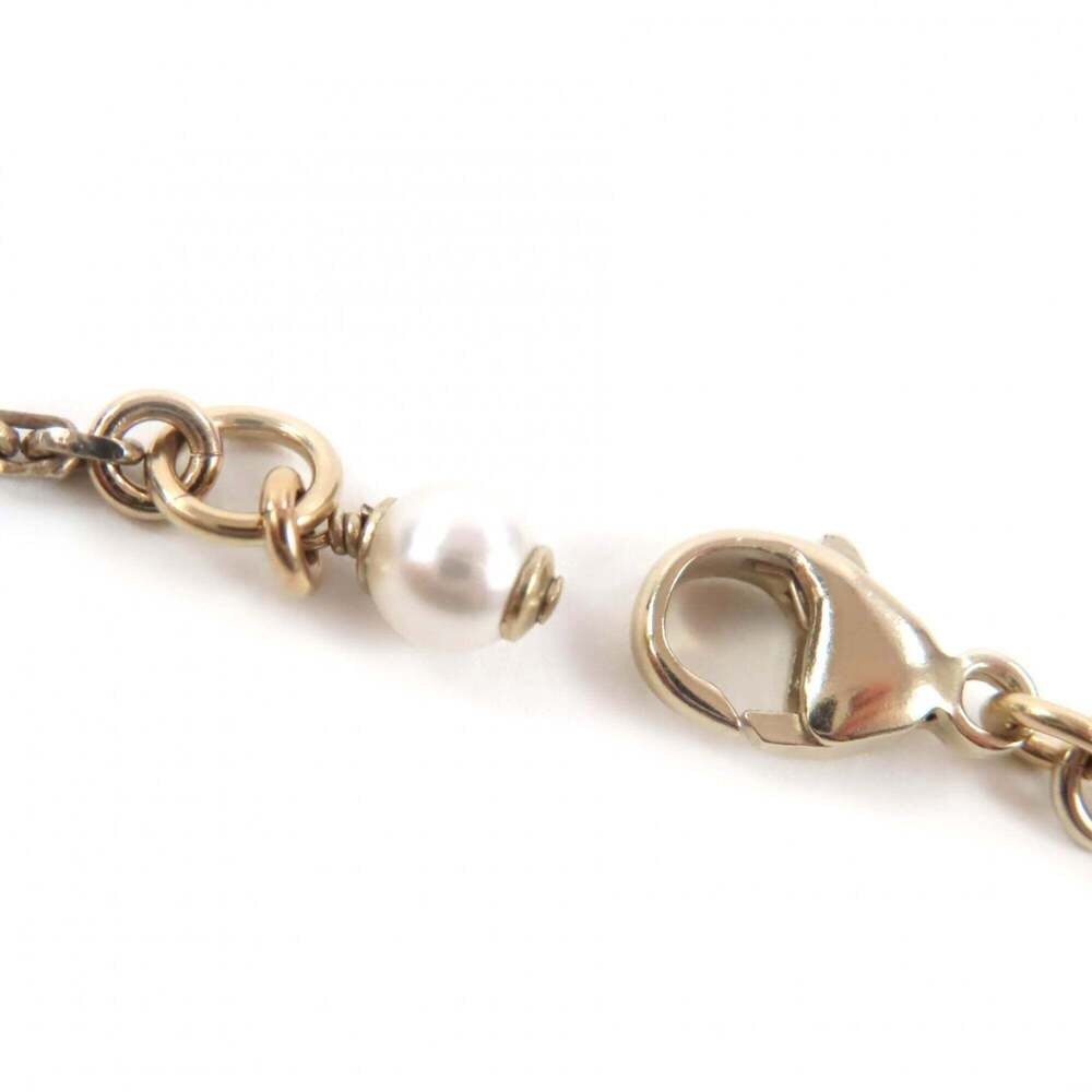 CHANEL Gold Logo Necklace - Picture 6 of 9